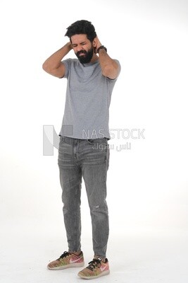 Saudi man wearing a casual dress with his hands on his head, feeling pain and headache, wearing a white dress with a shemagh and headband, white background