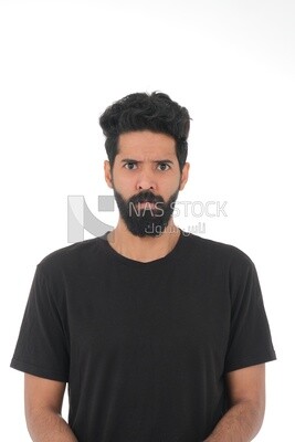 close-up of a Saudi man in the casual dress looks angry, Saudi model, white background