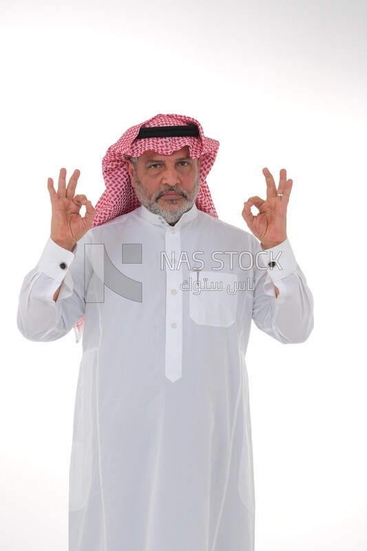 Saudi man with different facial and hands gestures, a Saudi young man wearing a white dress with a shemagh and headband, white background, Saudi model