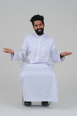 close-up of a Saudi man in traditional Saudi dress, sitting on a chair, Saudi model, white background