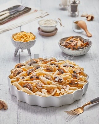 Plate of pasta with mushrooms and appetizers