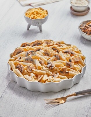 Top view of a plate of pasta with mushrooms