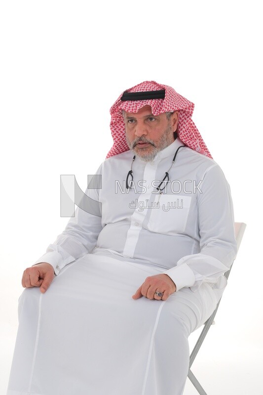 close-up of a Saudi man in traditional Saudi dress, sitting on a chair, Saudi model, white background