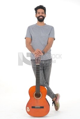 Saudi  man carrying a musical instrument, guitar playing talent, entertainment and singing, white background, Saudi model