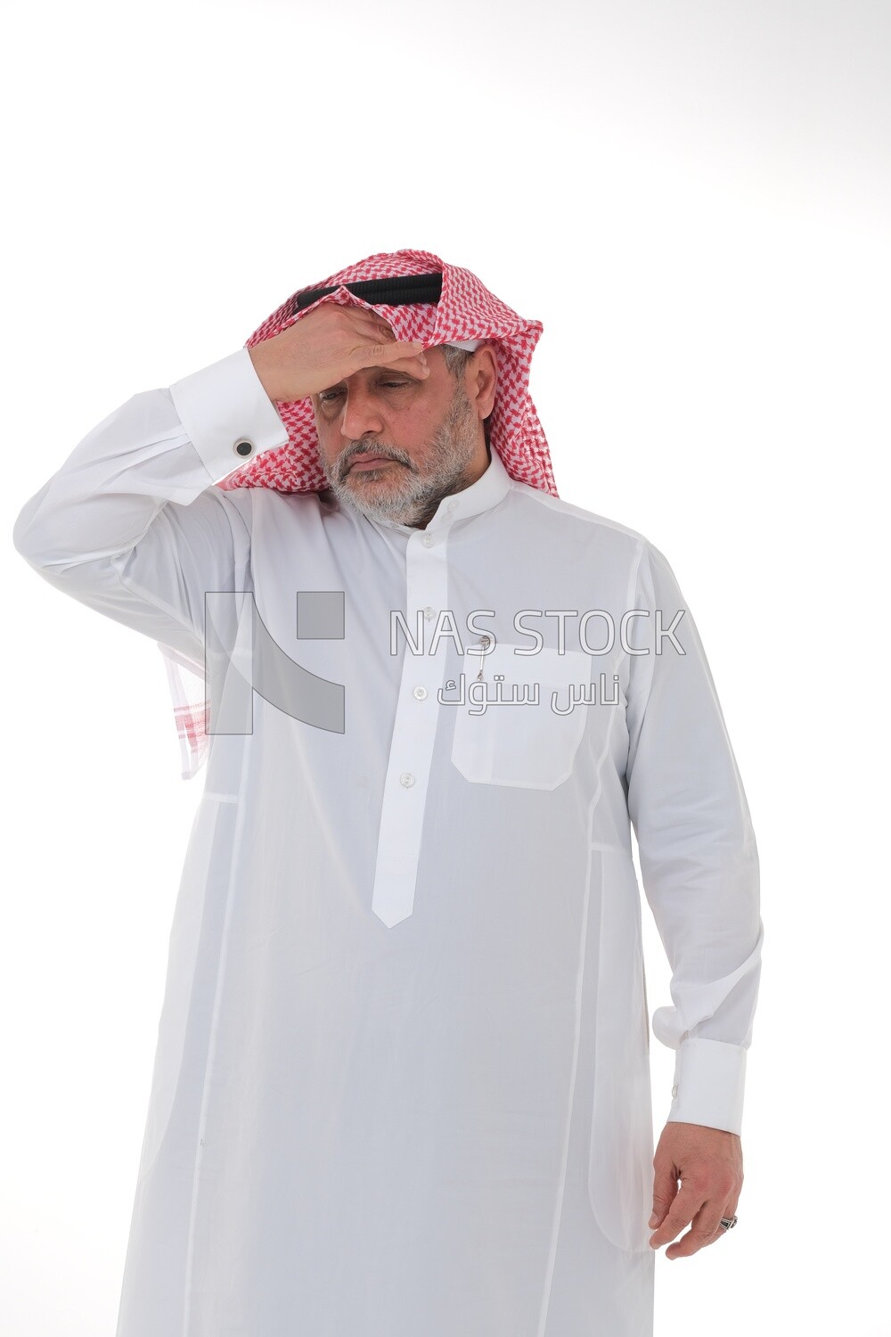 elderly Saudi man with his hands on his head, feeling pain and headache, wearing a white dress with a shemagh and headband, white background, an elderly man with pain in his head