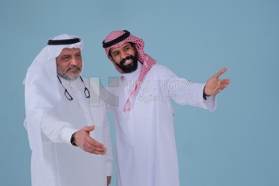 two Saudi men pointing at something, identifying a target, pointing towards something, finger movement and gestures