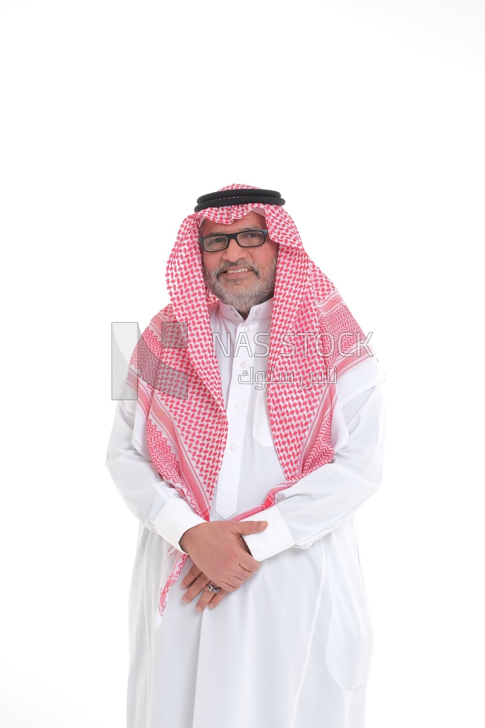 close-up of a Saudi man in traditional Saudi dress, wearing glasses, Saudi model, white background