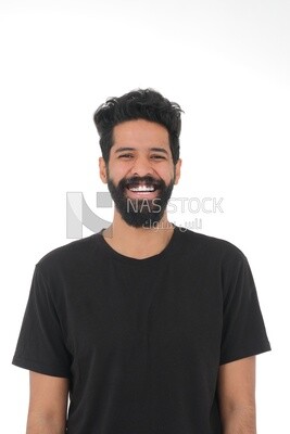 Saudi man wearing a casual dress looks happy, facial gestures indicating happiness and joy, self-confidence, white background, Saudi model