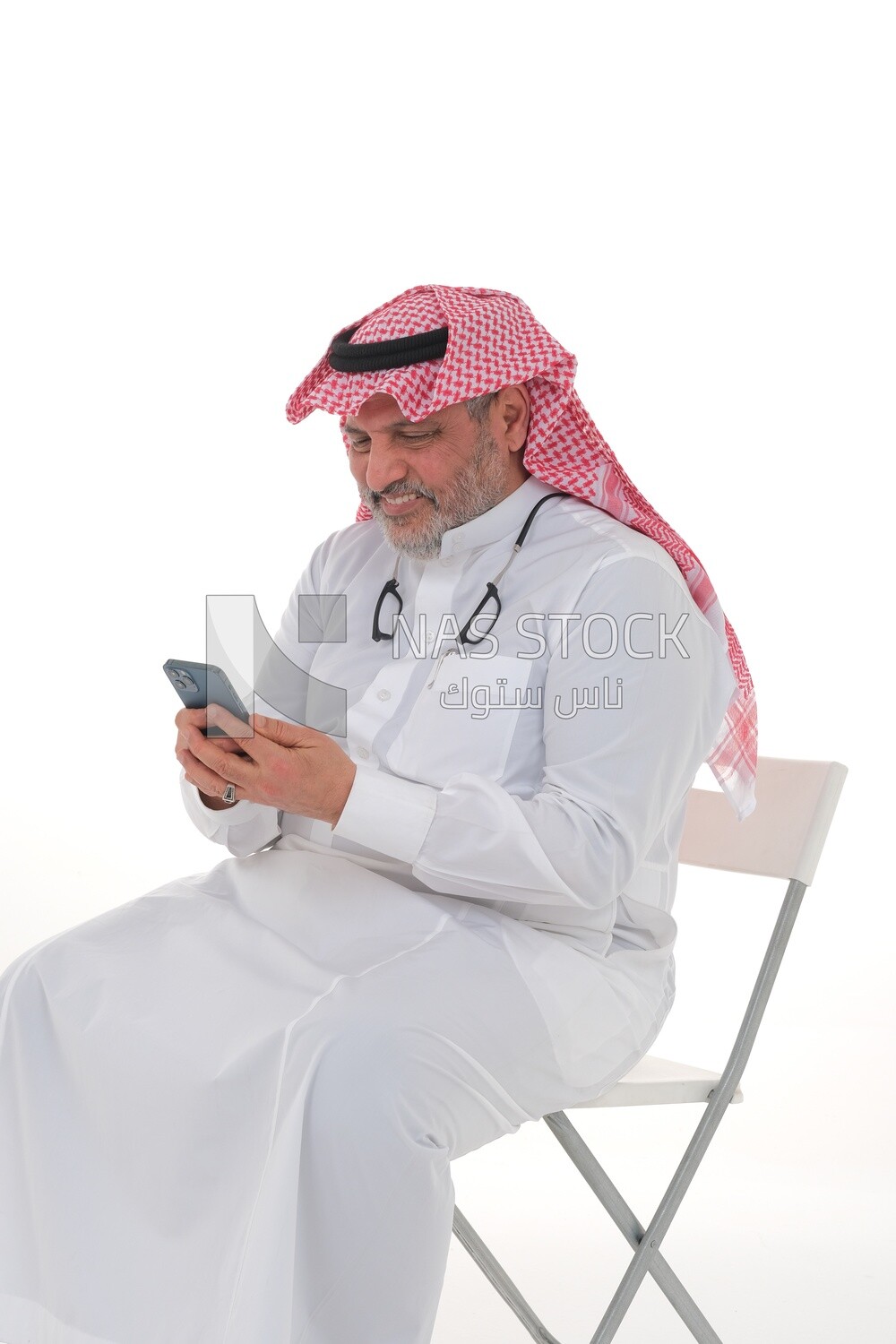 elderly Saudi man using a mobile phone, communicating with individuals, online requests and marketing, social relations, using technical devices, white background