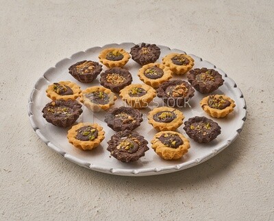 Petit four sweets on a solid background , Eid al-Fitr celebrations