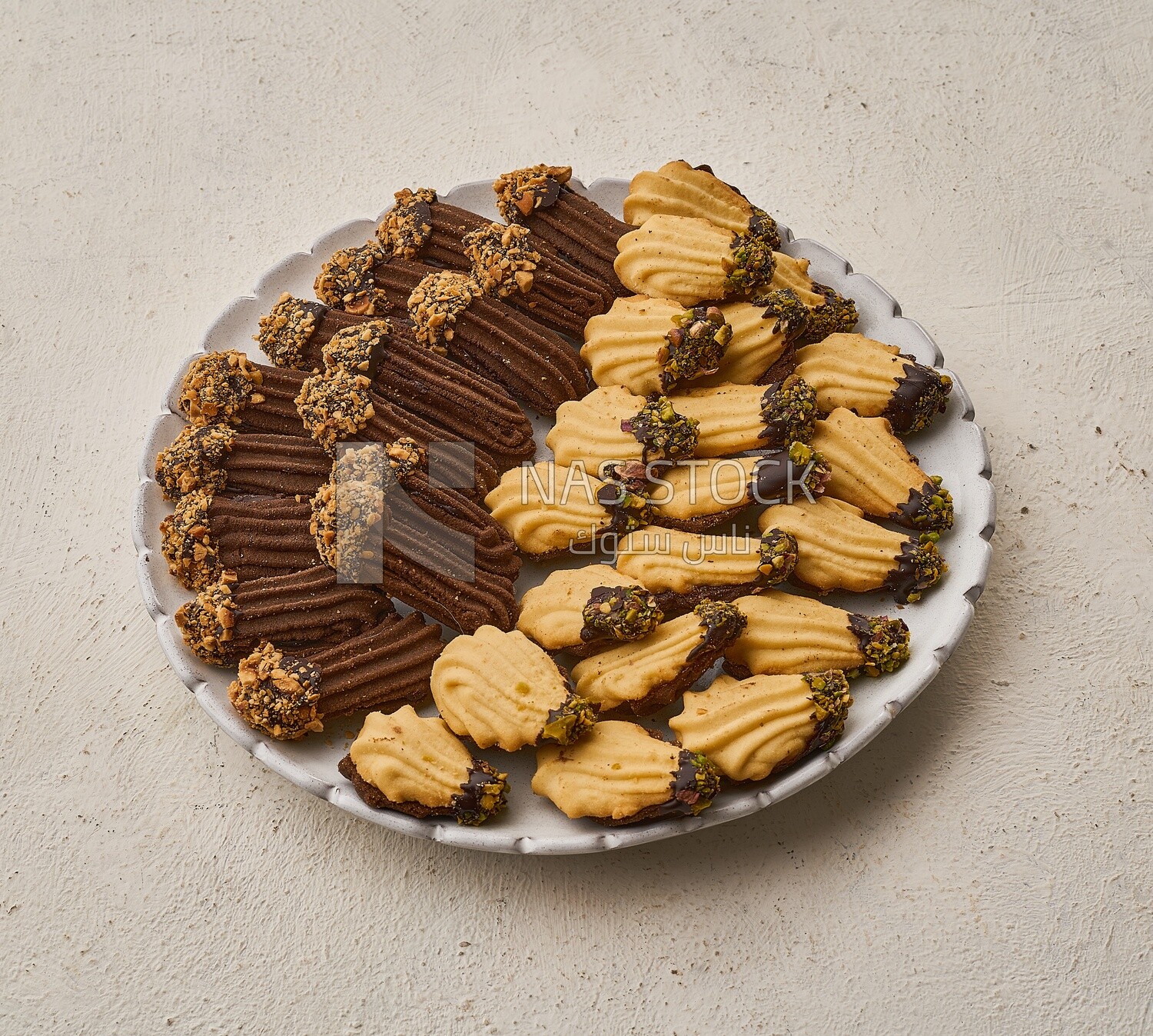 Petit four sweets on a solid background ,top view