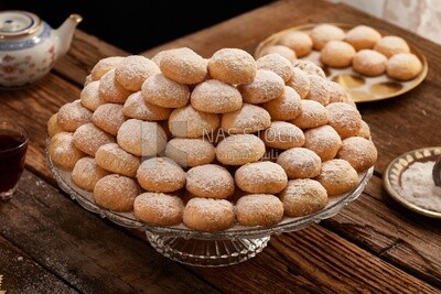 Kahk el Eid with powdered sugar ,Eid al-Fitr cookies ,top view