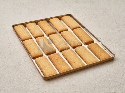 Biscuits stacked in sheet iron , Eid al-Fitr celebrations