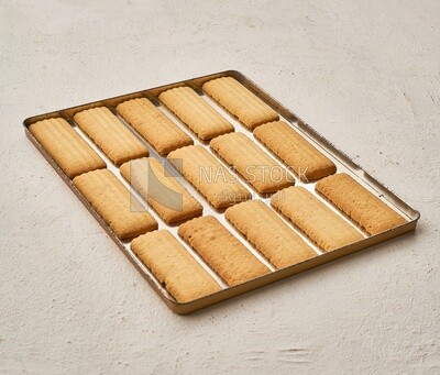 Biscuits stacked in sheet iron on an isolated background