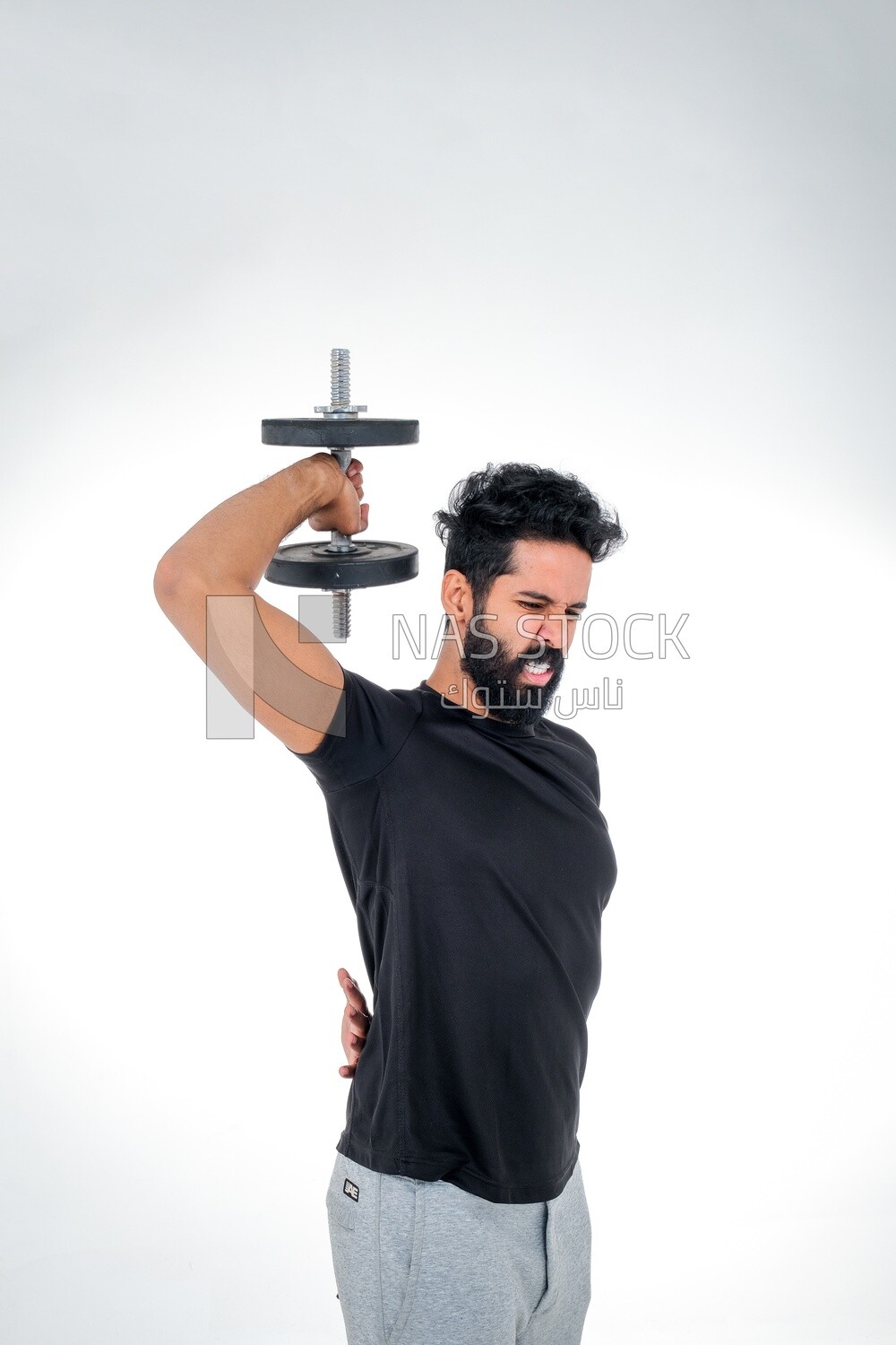 Saudi man Wearing sports clothes, exercising with dumbbells, bodybuilding, healthy lifestyle, building muscle, white background, Saudi model