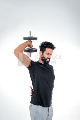 Saudi man Wearing sports clothes, exercising with dumbbells, bodybuilding, healthy lifestyle, building muscle, white background, Saudi model