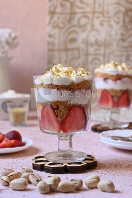 Cup of kunafa with strawberries and cream