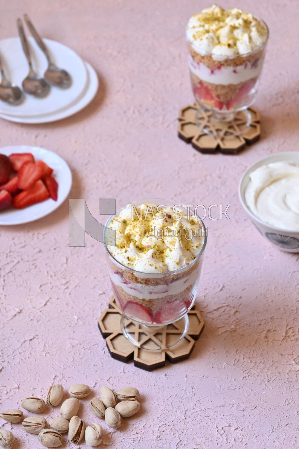 Cup of Kunafa with strawberries and cream