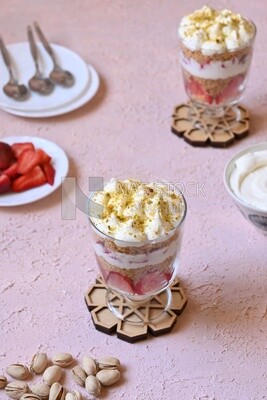 Top view of a cup of Kunafa with strawberries