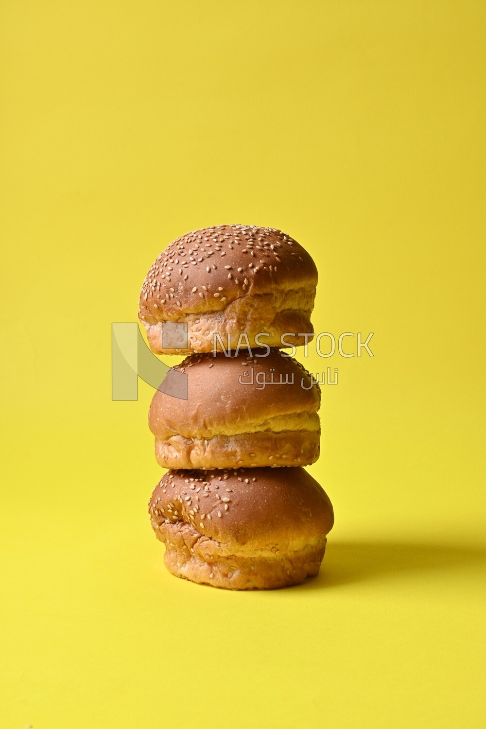 Three buns with sesame seeds, fast food, Arabic restaurants, delicious food