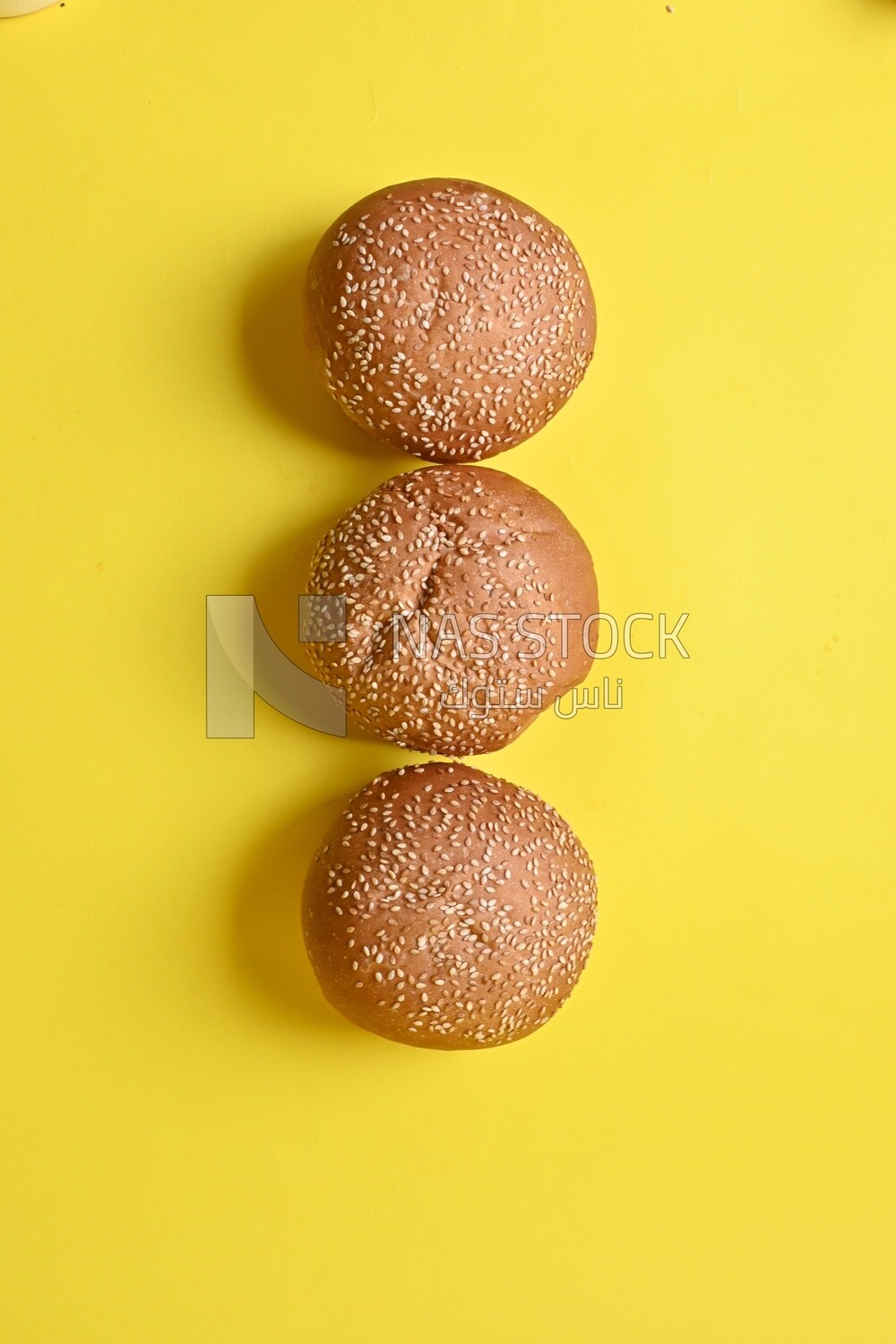Three buns with sesame seeds, fast food, Arabic restaurants, delicious food