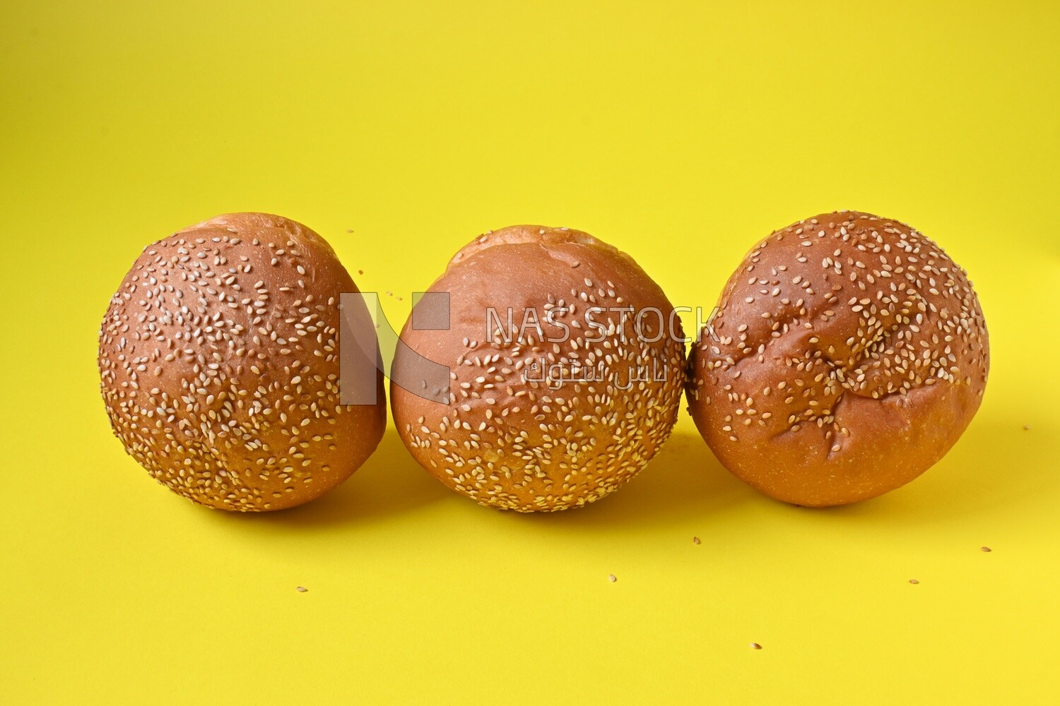Three buns with sesame seeds, fast food, Arabic restaurants, delicious food