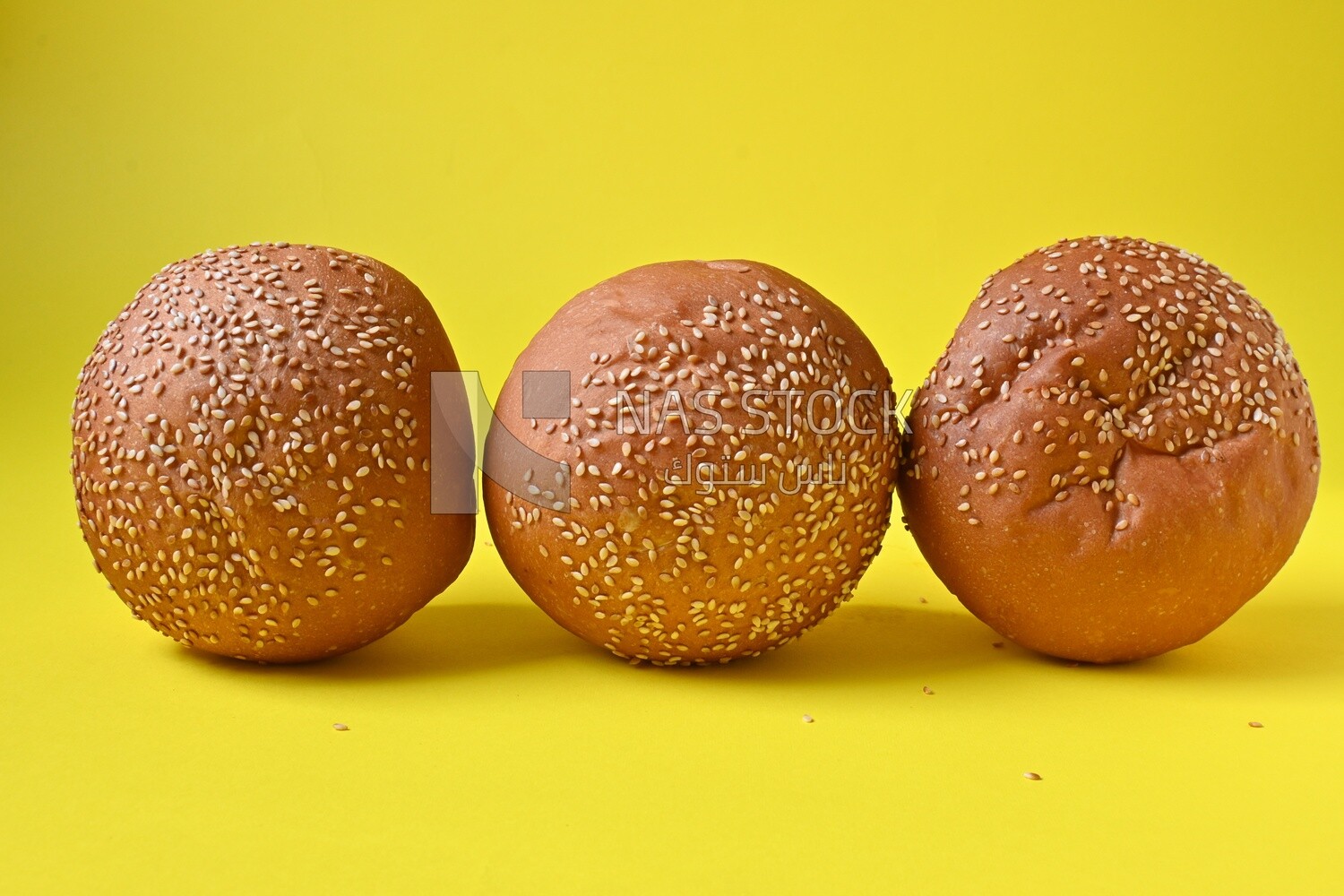Three buns with sesame seeds, fast food, Arabic restaurants, delicious food