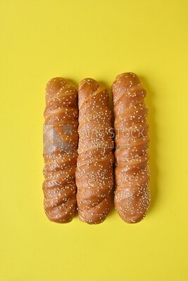 Three fino loaves with sesame seeds, fast food, Arabic restaurants, delicious food