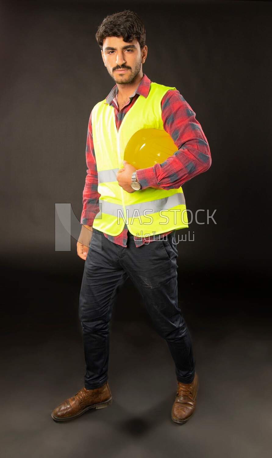 An engineer man wearing a safe jacket