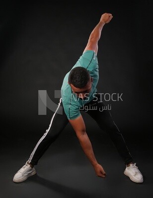 A man training on a black background