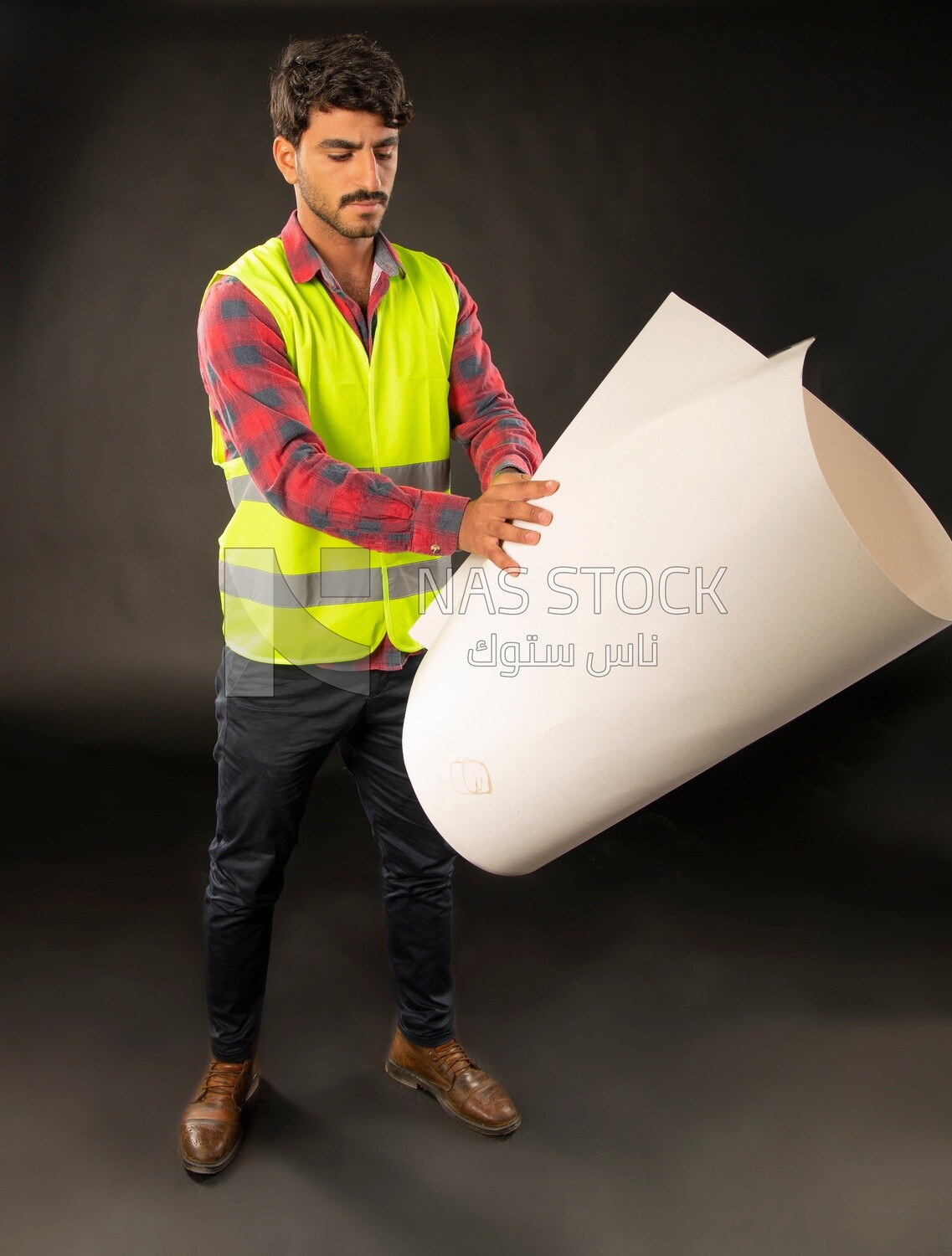 An engineer man wearing a safe jacket