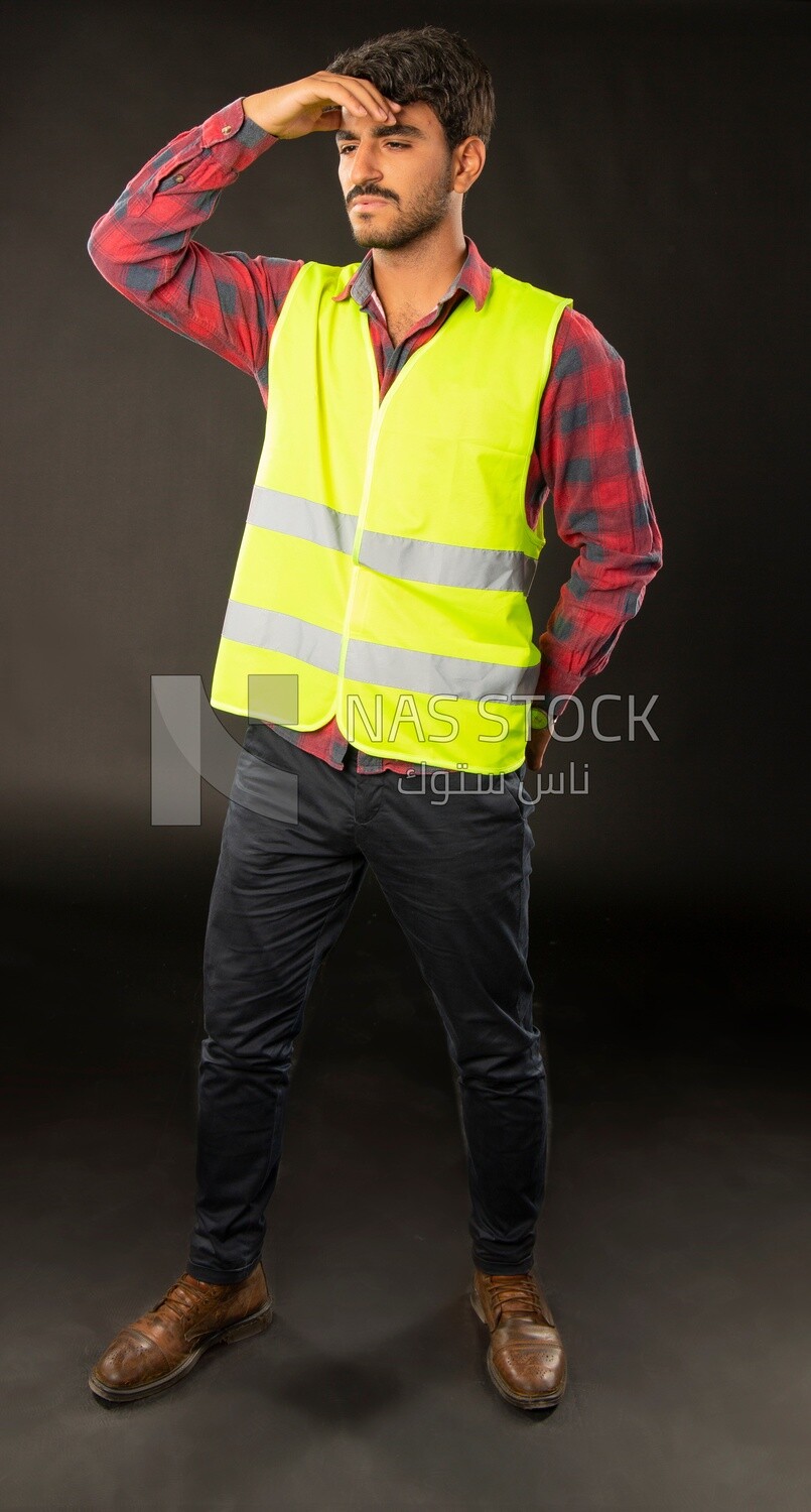 An engineer man wearing a safe jacket