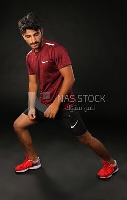 A man training on a black background