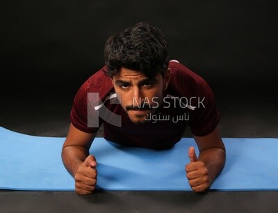 A man training on a black background