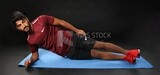 A man training on a black background