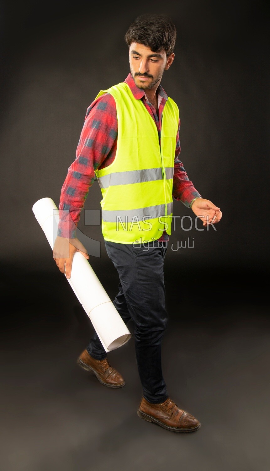 An engineer man wearing a safe jacket