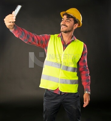 An engineer man wearing a safe jacket
