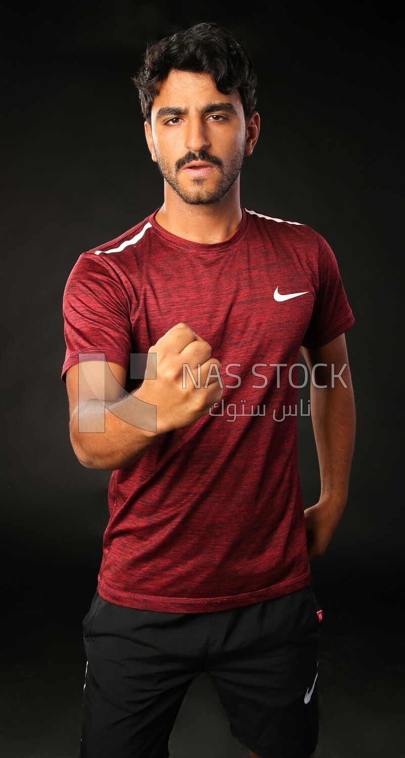 A man running on a black background