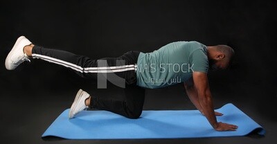A man training on a black background