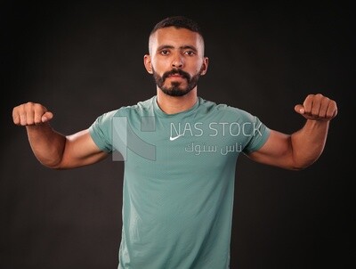 A man training on a black background