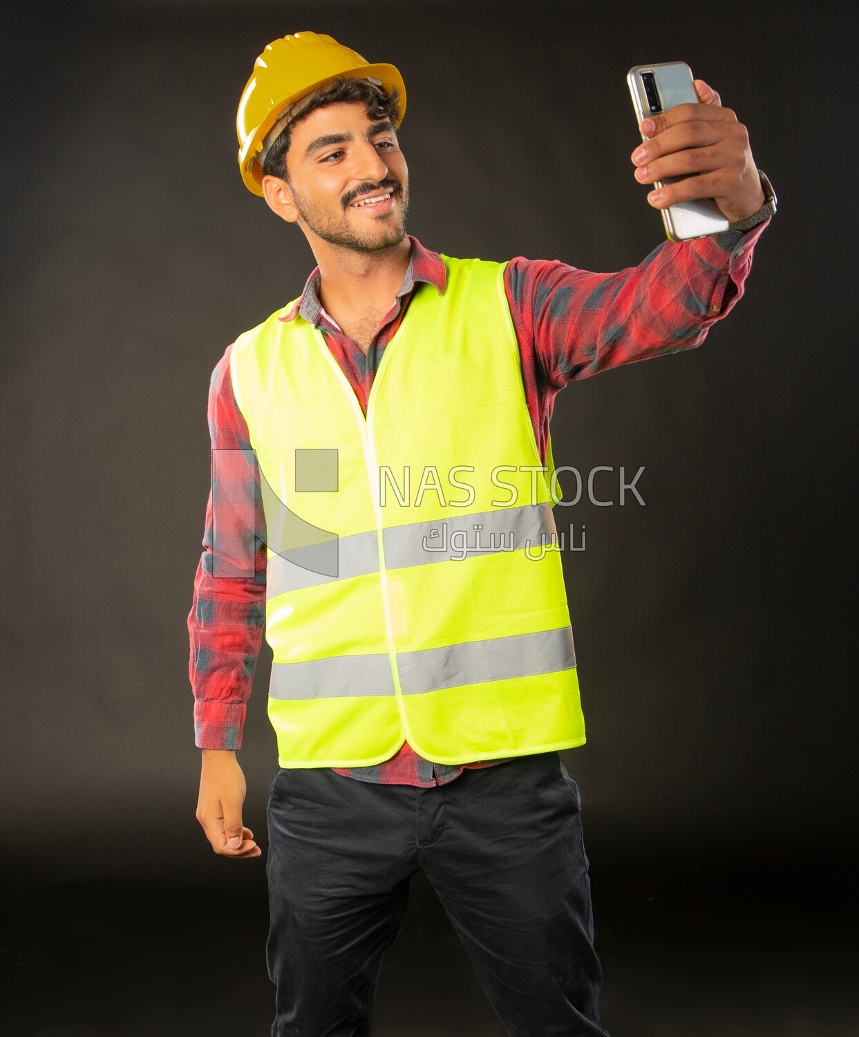 An engineer man wearing a safe jacket