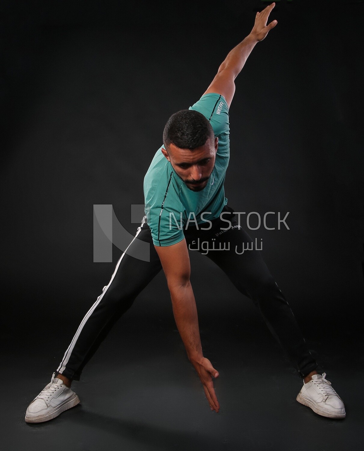 A man training on a black background