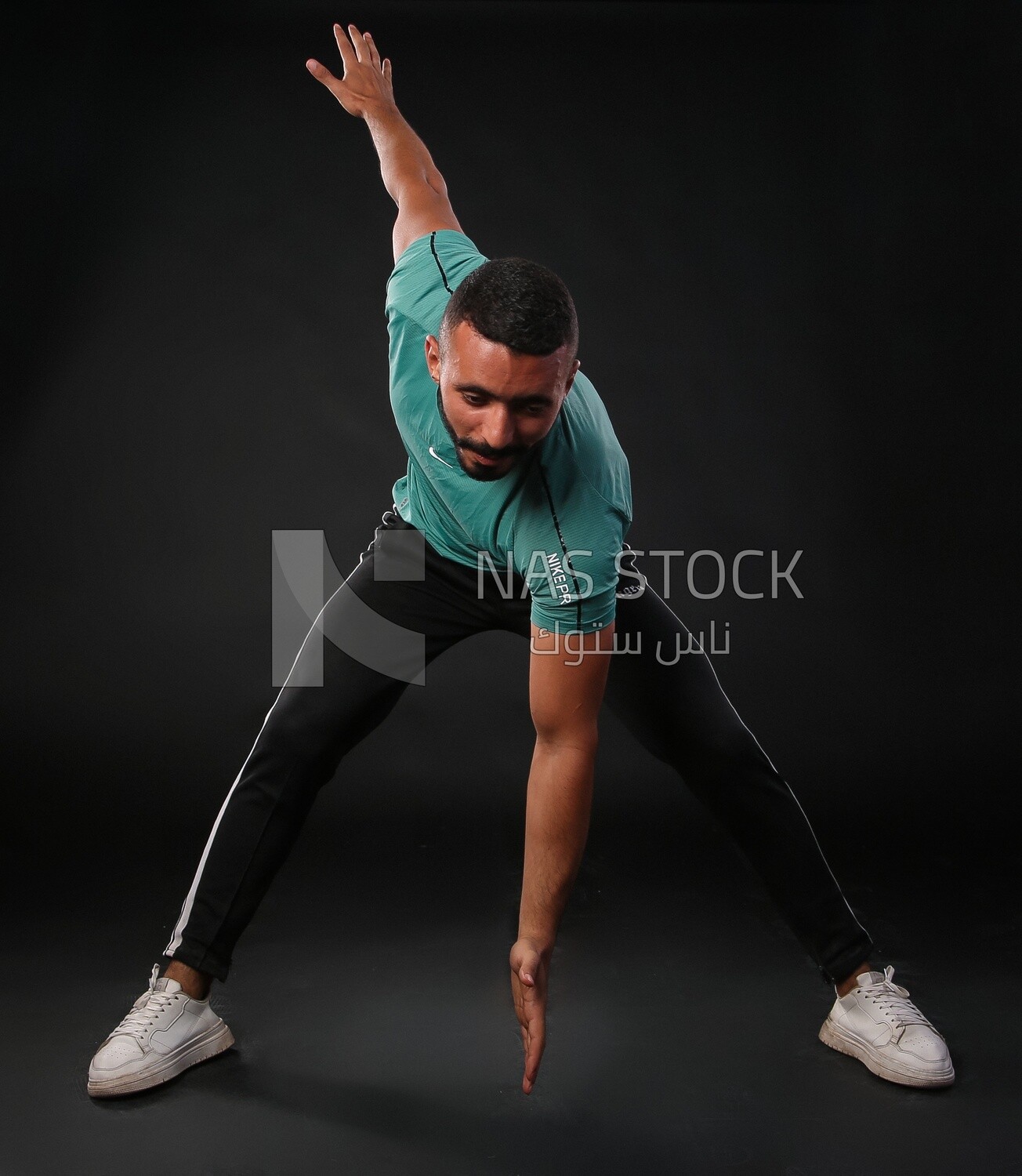A man training on a black background