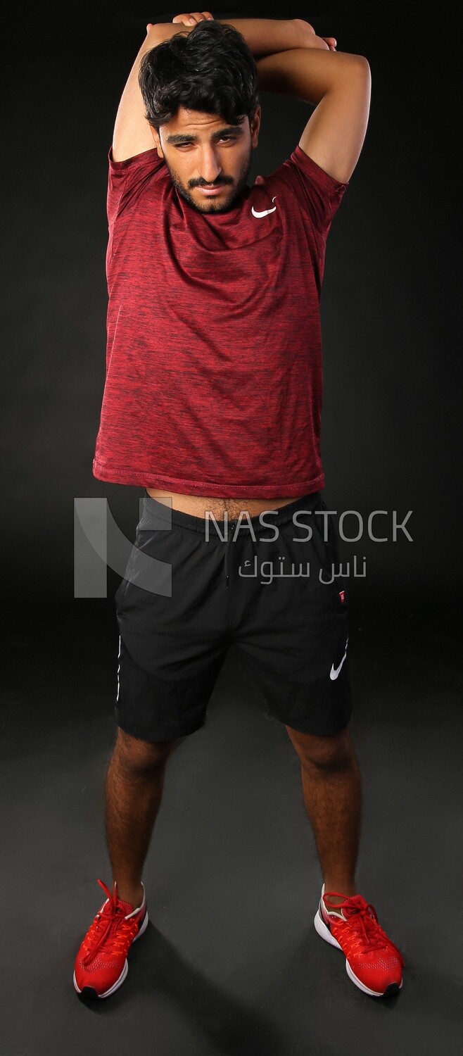 A man training on a black background