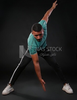 A man training on a black background