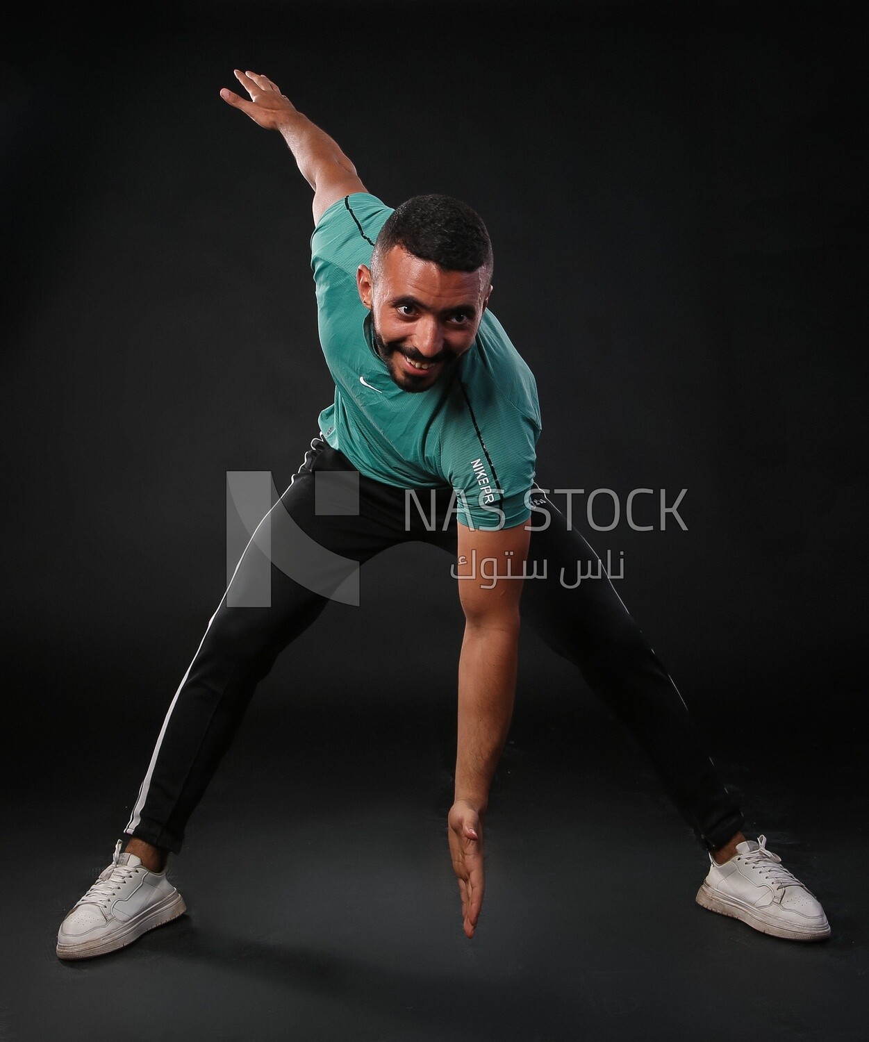 A man training on a black background