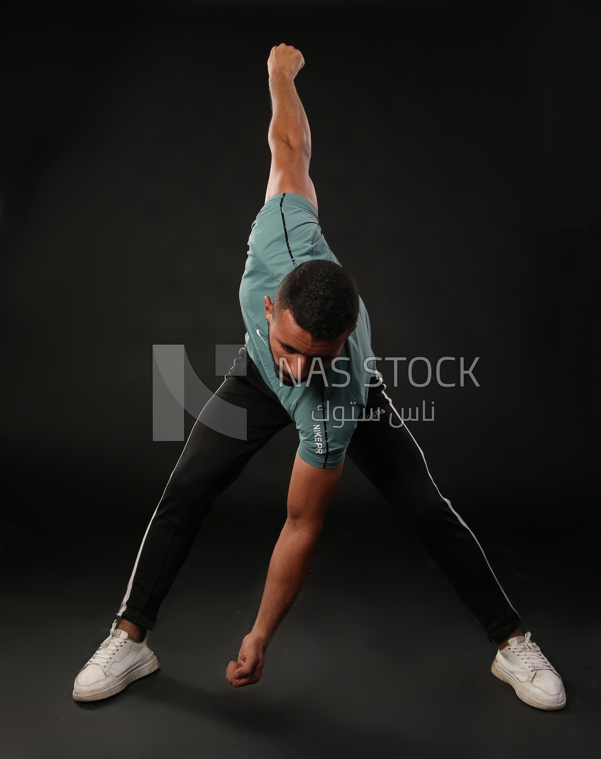 A man training on a black background