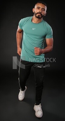 A man running on a black background
