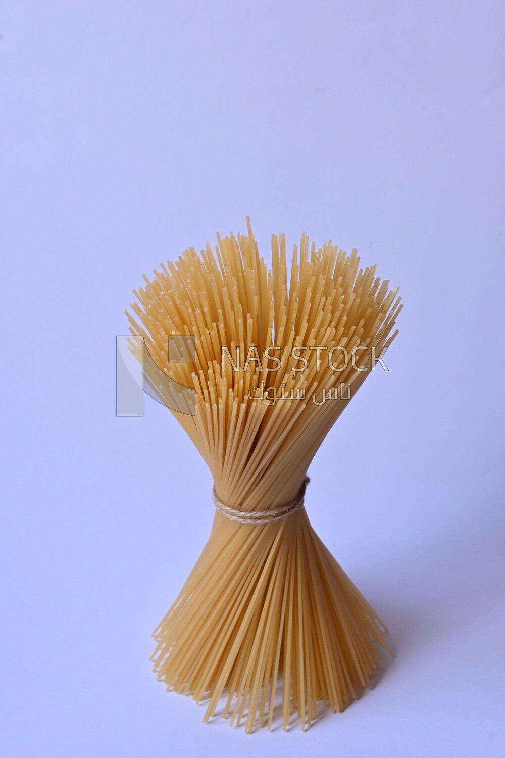 Package of uncooked spaghetti pasta