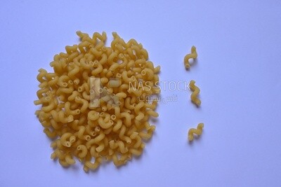 Uncooked Cellentani pasta ,One of the types of pasta